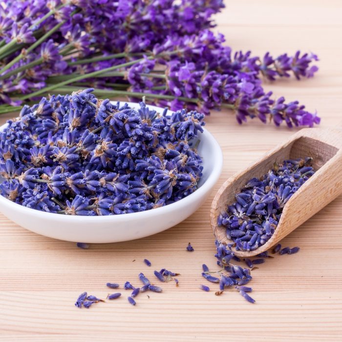 lavender flowers in bowl and scoop