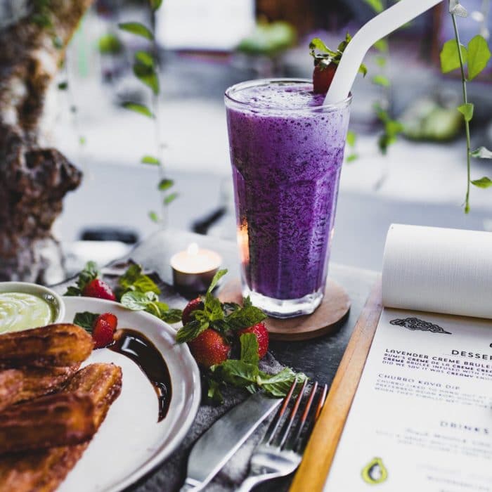 food with purple smoothie and lavender menu